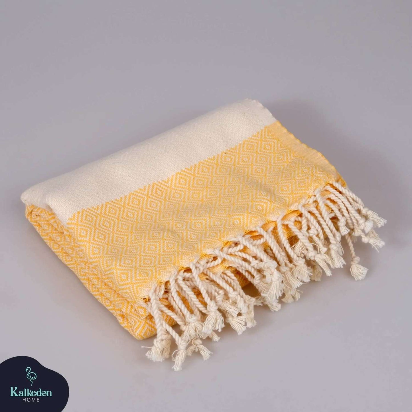 Elegant diamond-shaped beach towel, crafted with absorbent Turkish cotton