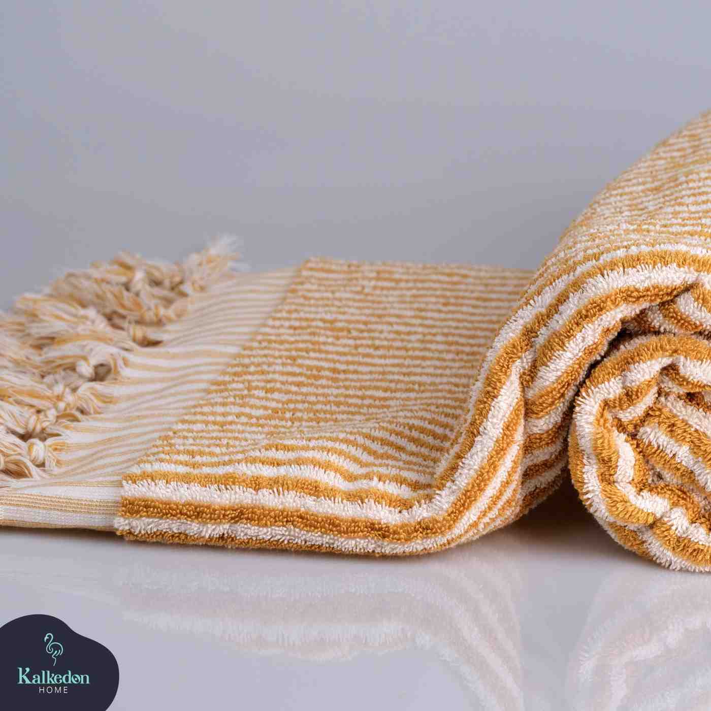 mustard striped bath towel