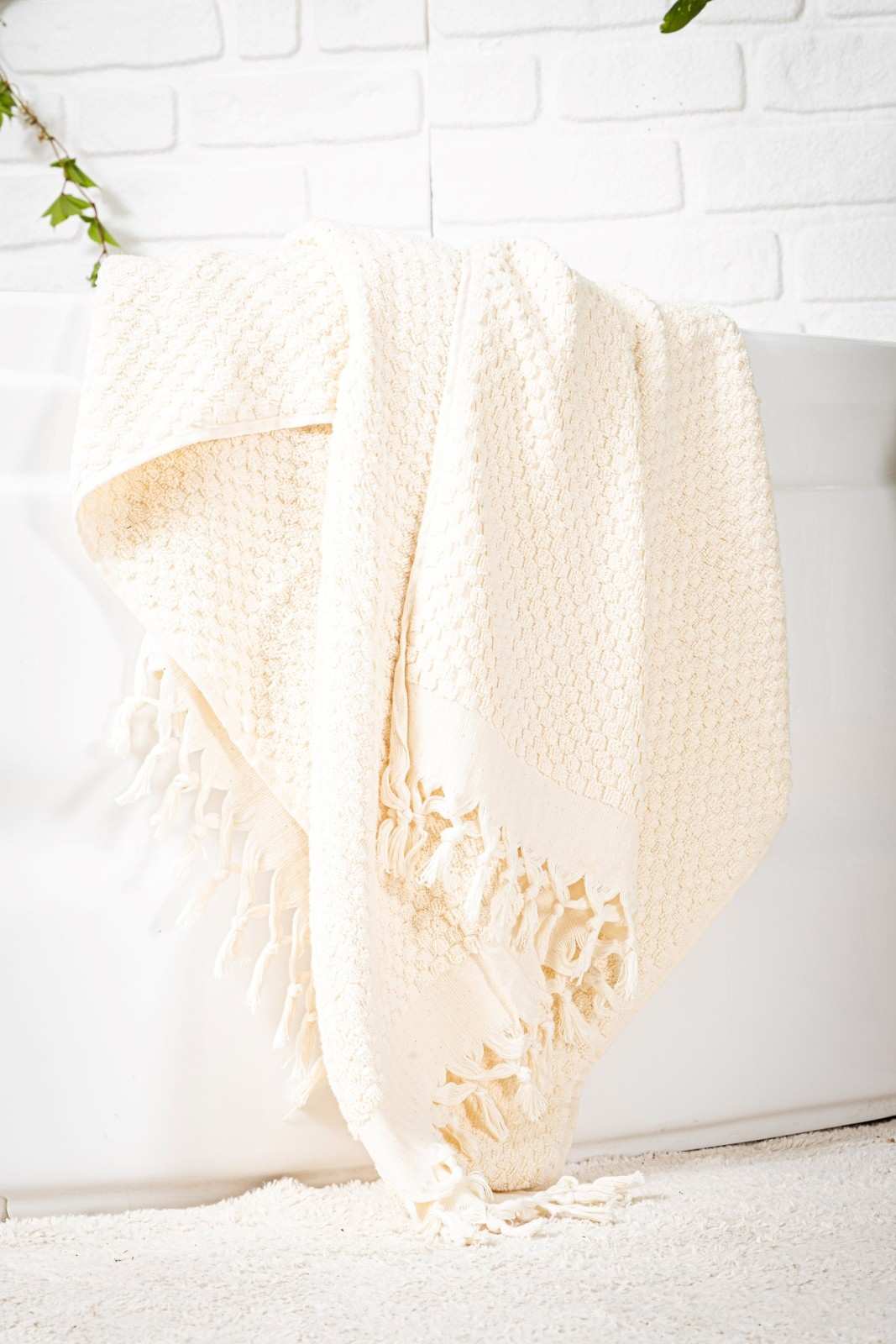 Extra-large, plush striped bath towel crafted with superior quality organic cotton, machine washable