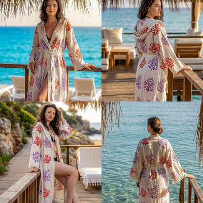 Woman wearing a floral robe by a poolside with ocean view