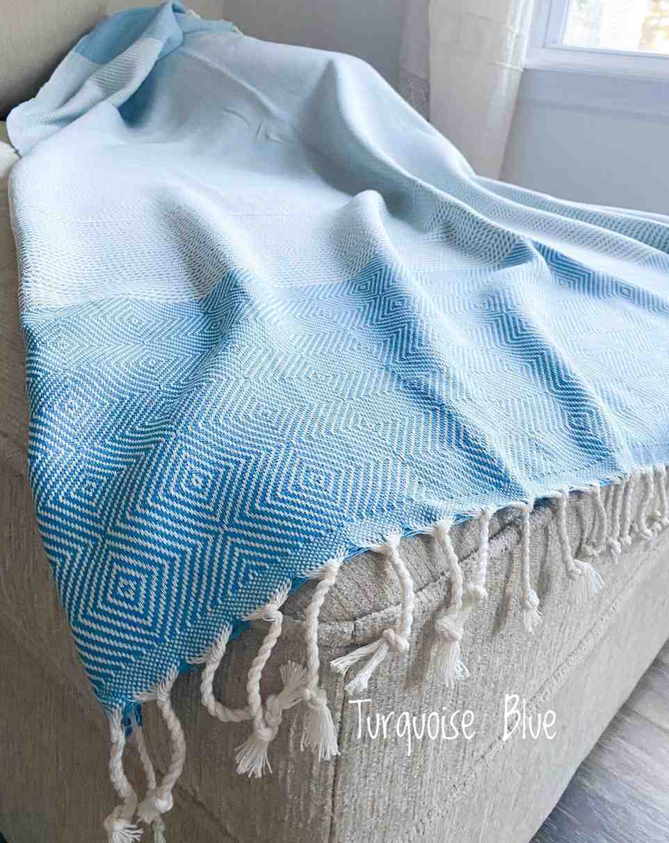 Thicker-than-average Turkish throw blanket ideal as a wedding favor or bachelorette gift.