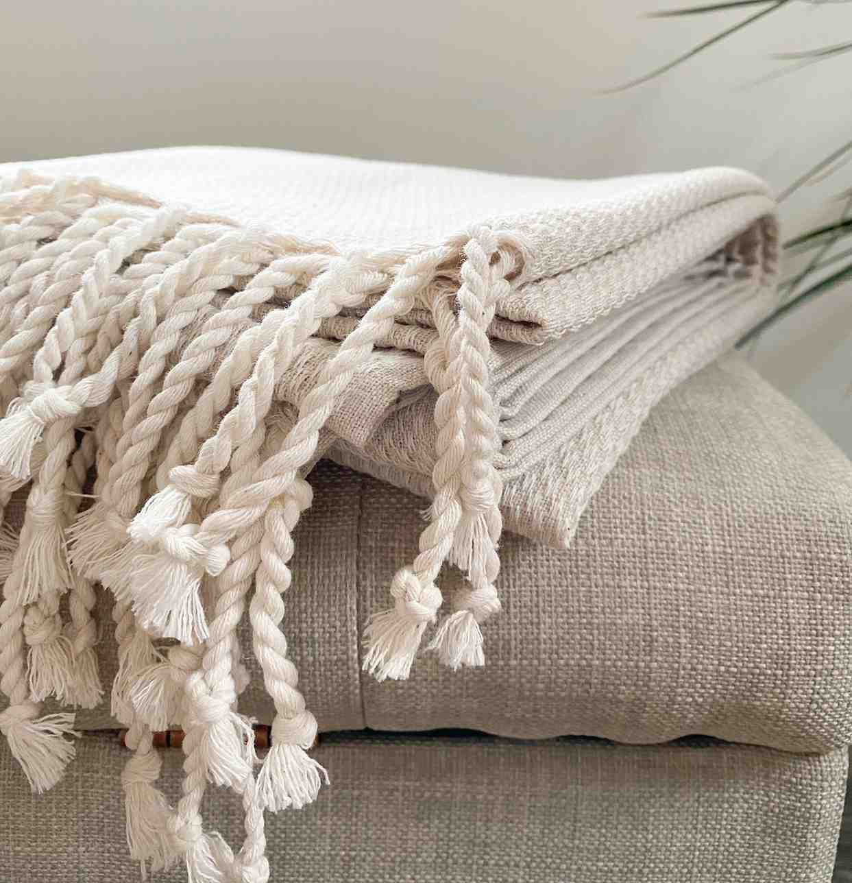  Lightweight Turkish cotton blanket for versatile home decor.