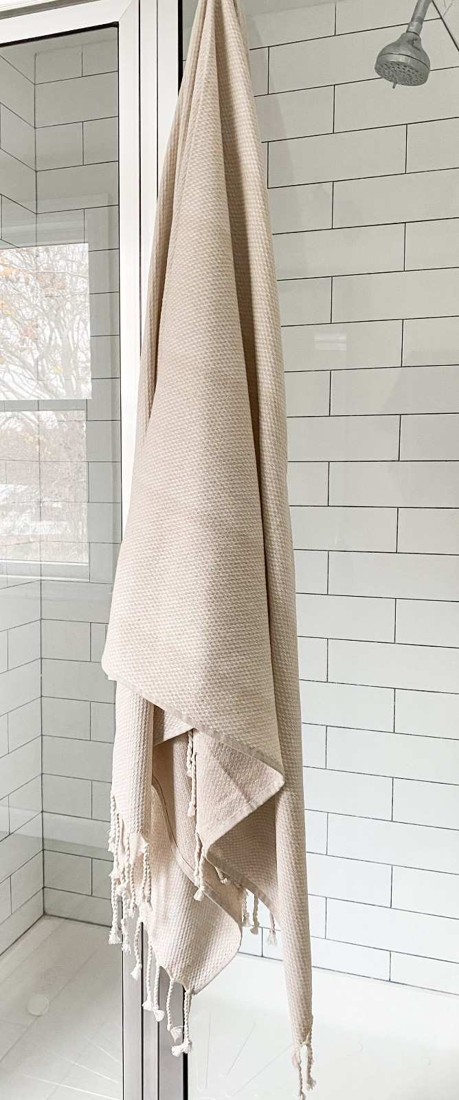Handwoven Turkish cotton throw blanket with intricate design.